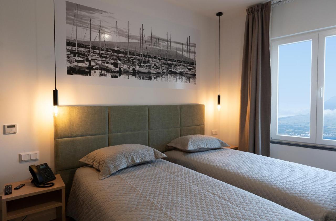 Aparthotel Horta Bay Esterno foto